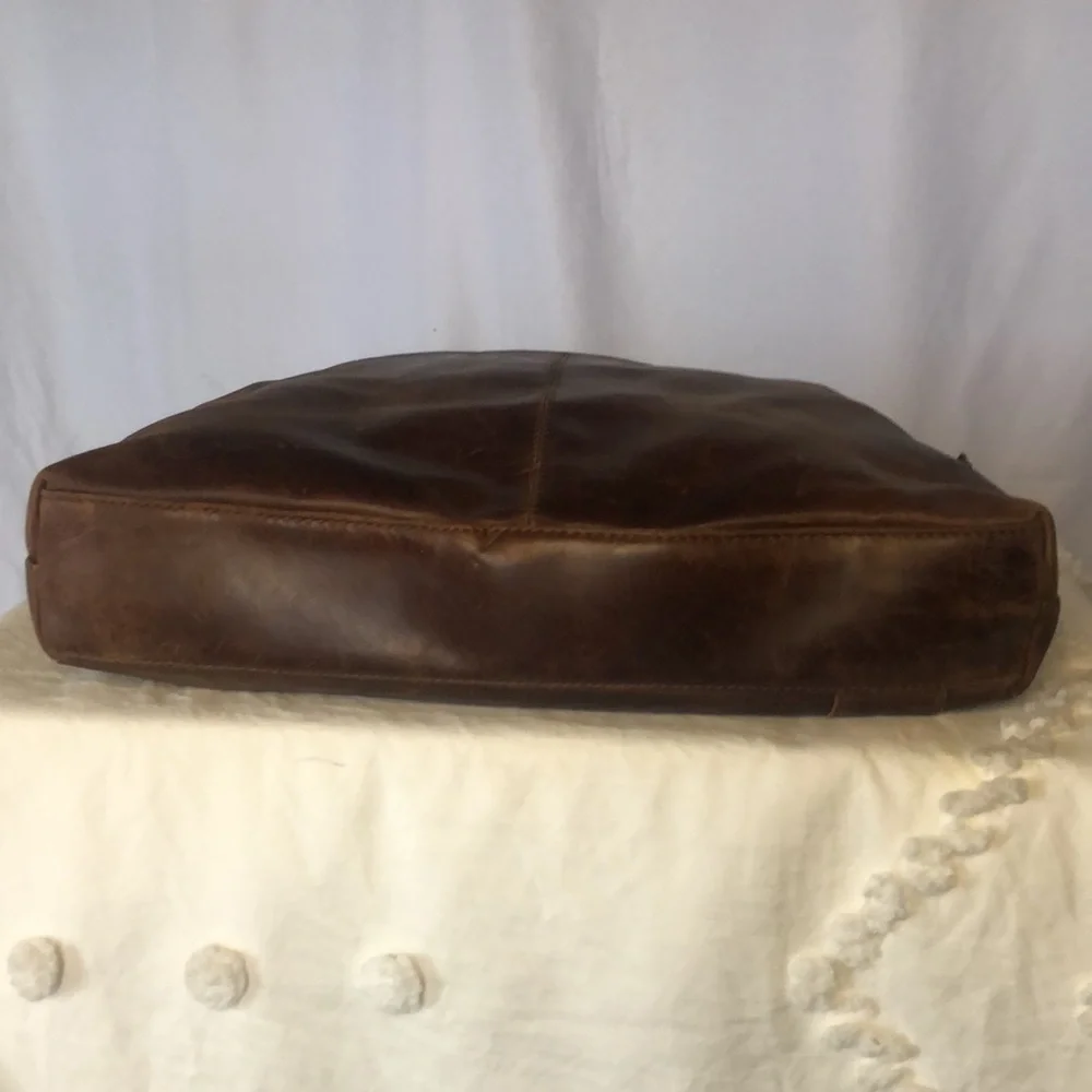 BACCINI Leandro cognac brown distressed genuine leather laptop bag. Detach strap
